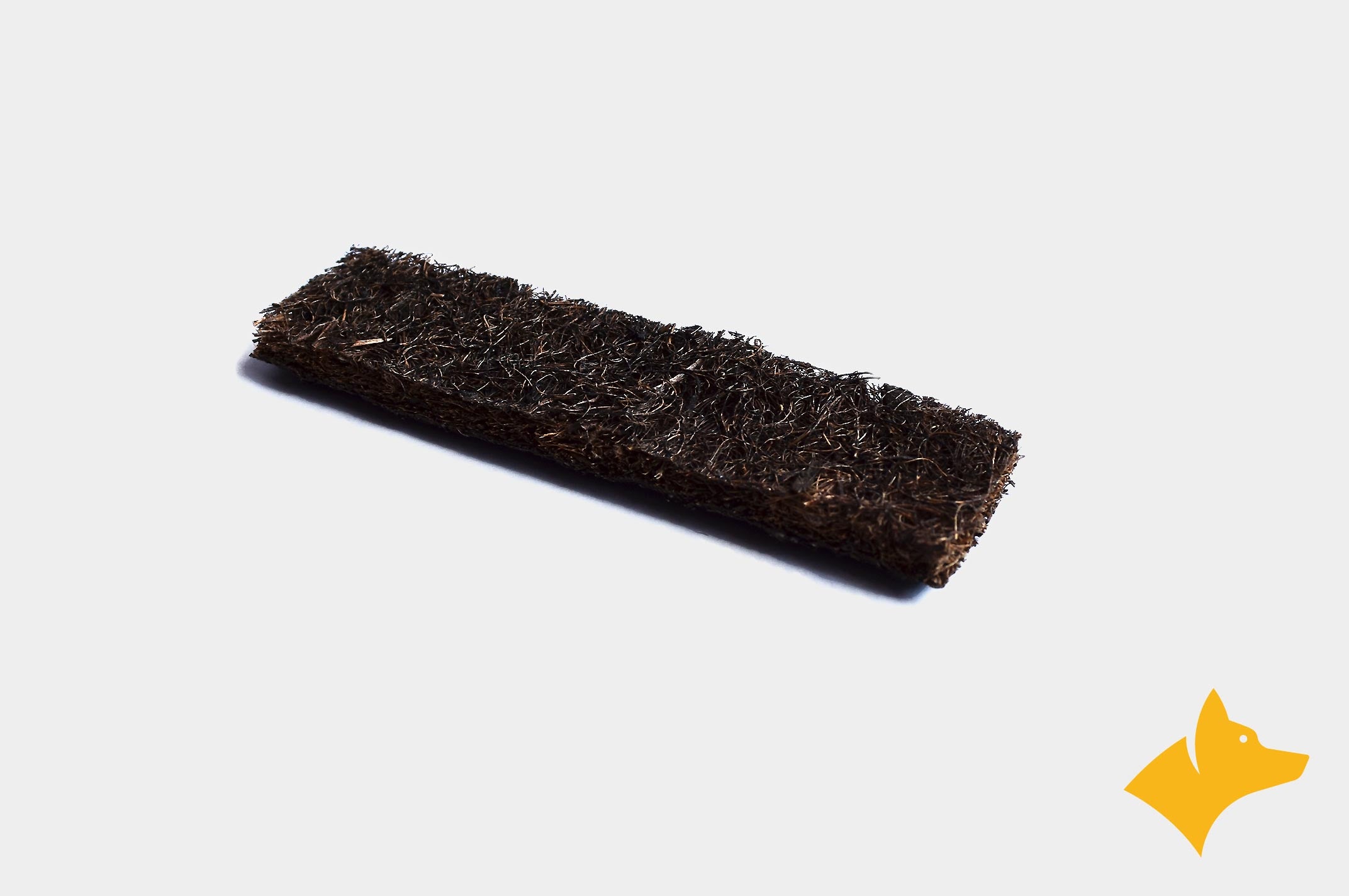 Dark brown coconut fiber with a slightly rubberized underside